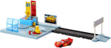 DISNEY CARS On the Road - Dinoco Rusteze Racing Center Playset