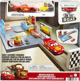 DISNEY CARS On the Road - Dinoco Rusteze Racing Center Playset